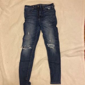 American Eagle jeans with rips on knee